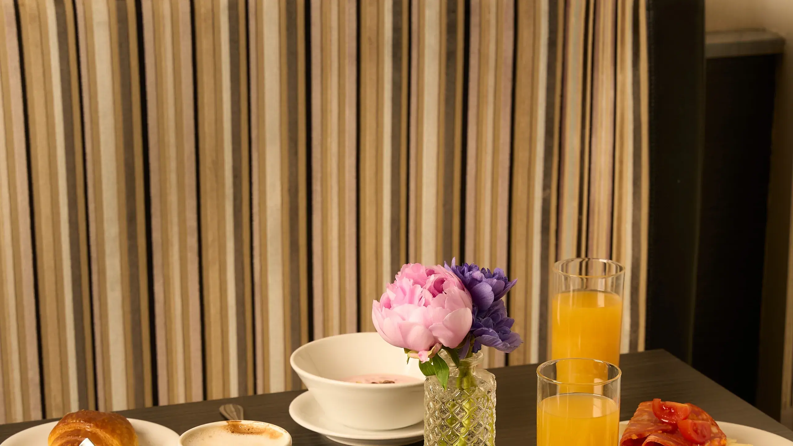 A breakfast table laid in the garden