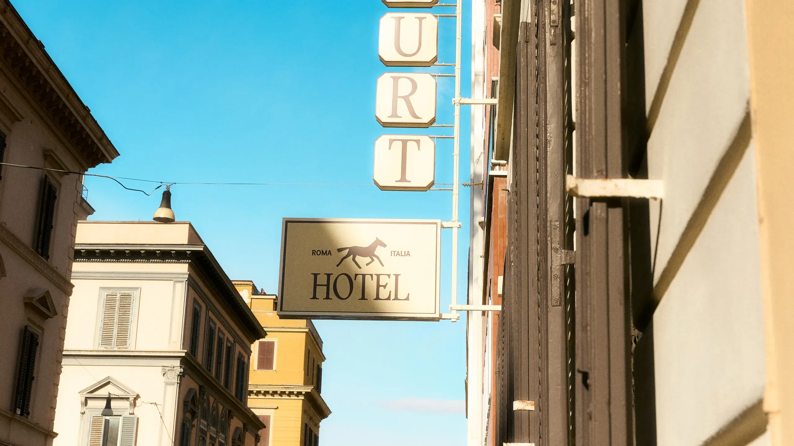 The facade of Via Marghera 29 against the sky
